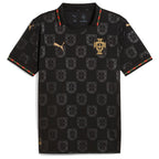 Portugal Special Edition Football Shirt Puma jet black showing all-over tonal black FPF Quinas Portuguese coat of arms shield monogram repeat pattern across full shirt gold FPF cross crest Quinas gold colorway gold Puma leaping cat logo on chest gold Puma logo on sleeve black polo collar red green gold Portuguese flag stripe trim matching red green gold cuff trim Puma RE:FIBRE badge front flat lay view on white background
