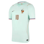 France Away Football Shirt 2026 Nike mint ice green showing FFF bronze Gallic Rooster crest with 2 gold stars Nike swoosh number 10 in bronze on chest orange seam side accent blue red orange cuff trim crew neck front side angle view on white background