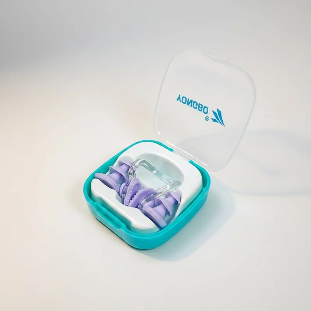 YONGBO swimming nose clip and purple ear plugs set in teal storage case open view