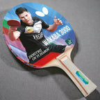 Butterfly Wakaba 3000 Table Tennis Racket front face showing Dimitrij Ovtcharov photo label ITTF approved badge and striped wooden handle - product front view
