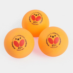 Butterfly 3 Star Plastic 40+ Table Tennis Balls 3 orange balls close up showing ITTF approved Butterfly logo 40+ made in China stamp - orange balls close up