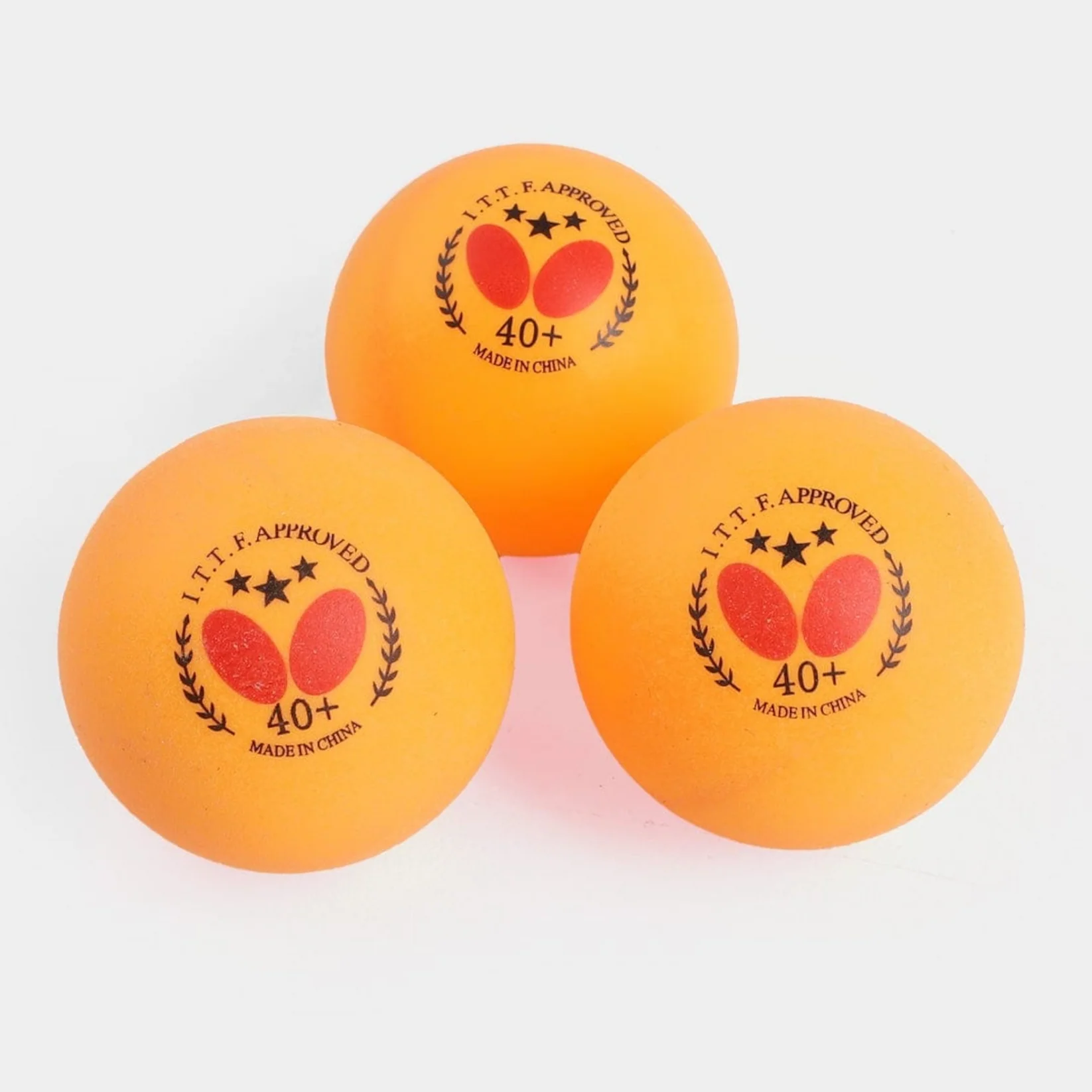 Butterfly 3 Star Plastic 40+ Table Tennis Balls 3 orange balls close up showing ITTF approved Butterfly logo 40+ made in China stamp - orange balls close up