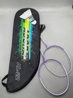Adoral AL-22 pro lightweight badminton racket set 2 purple rackets leaning against black Adoral AL-22 carry bag - side view