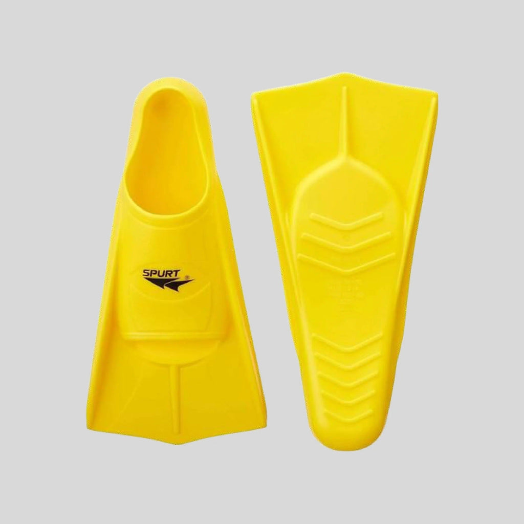 SPURT yellow silicone swimming fins - short blade training fins showing foot pocket and chevron textured sole