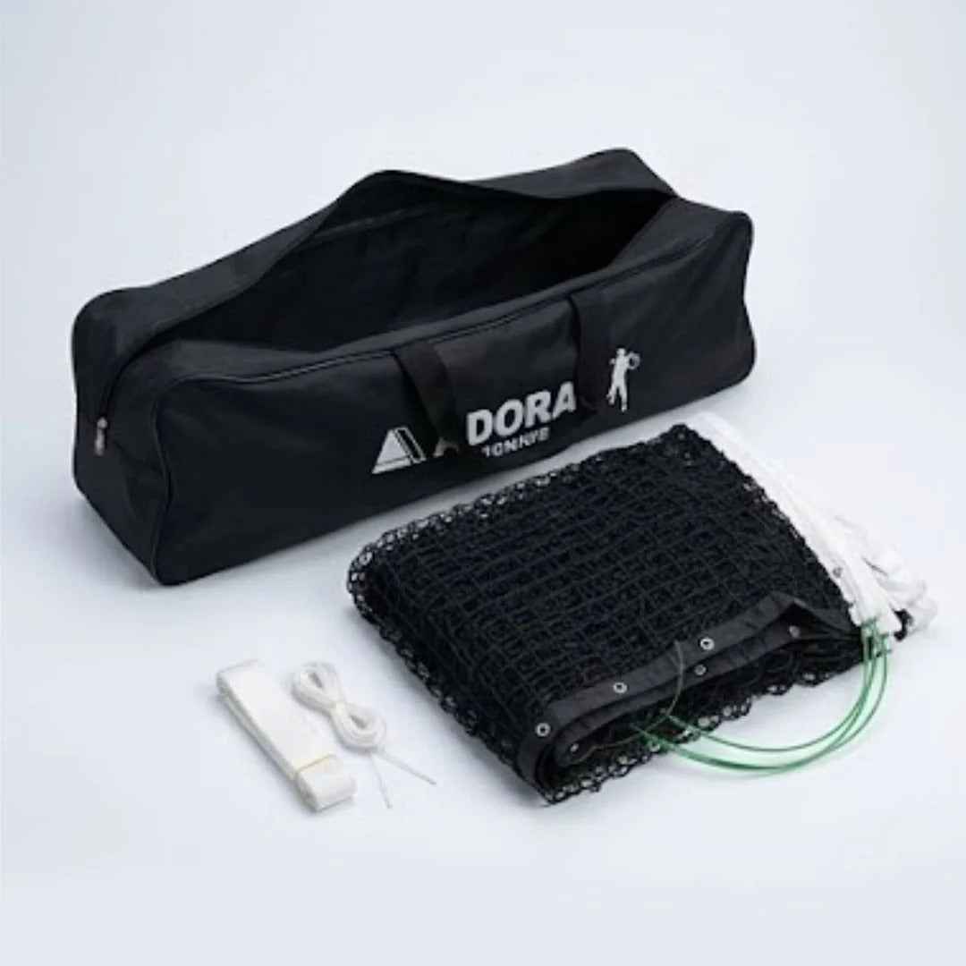 Adoral lawn tennis net double complete set showing folded black net, center strap and open black Adoral Tennis carry bag - side view