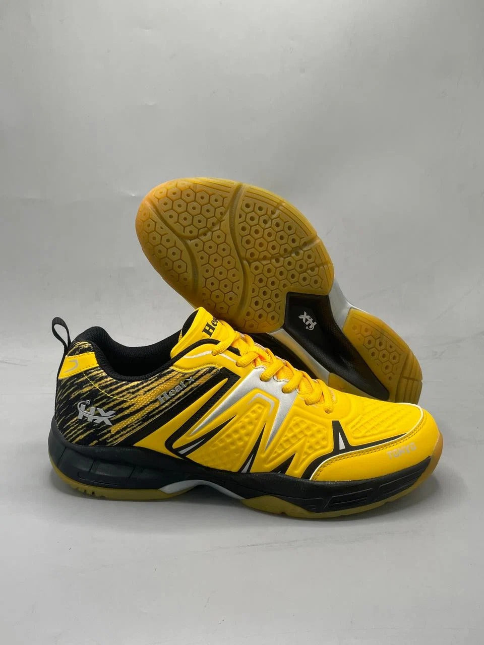 Heat X Tokyo badminton shoes black green colorway side view showing HX logo and Tokyo branding