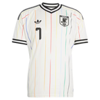 Japan Away Football Shirt 2026 Adidas Originals white showing multicolor vertical pinstripes red pink blue green yellow orange black full length JFA Japan Football Association eagle crest JAPAN text Adidas Originals trefoil logo number 7 black on chest black V-neck collar black double stripe Adidas cuffs front view on white background
