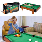 Tabletop pool table with cue sticks and billiard balls - full set