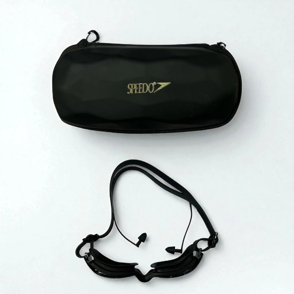 Speedo black competition swimming goggles with ear plugs and hard case - complete set flat lay