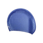 Blue silicone bubble swimming cap with oval textured pattern - flat lay view